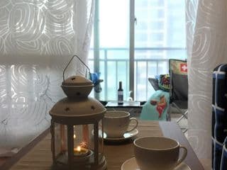 Cup of coffee looking at Saetgang ecological park photo 1