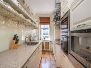 An elegant Late-Victorian style two BR apartment photo 3
